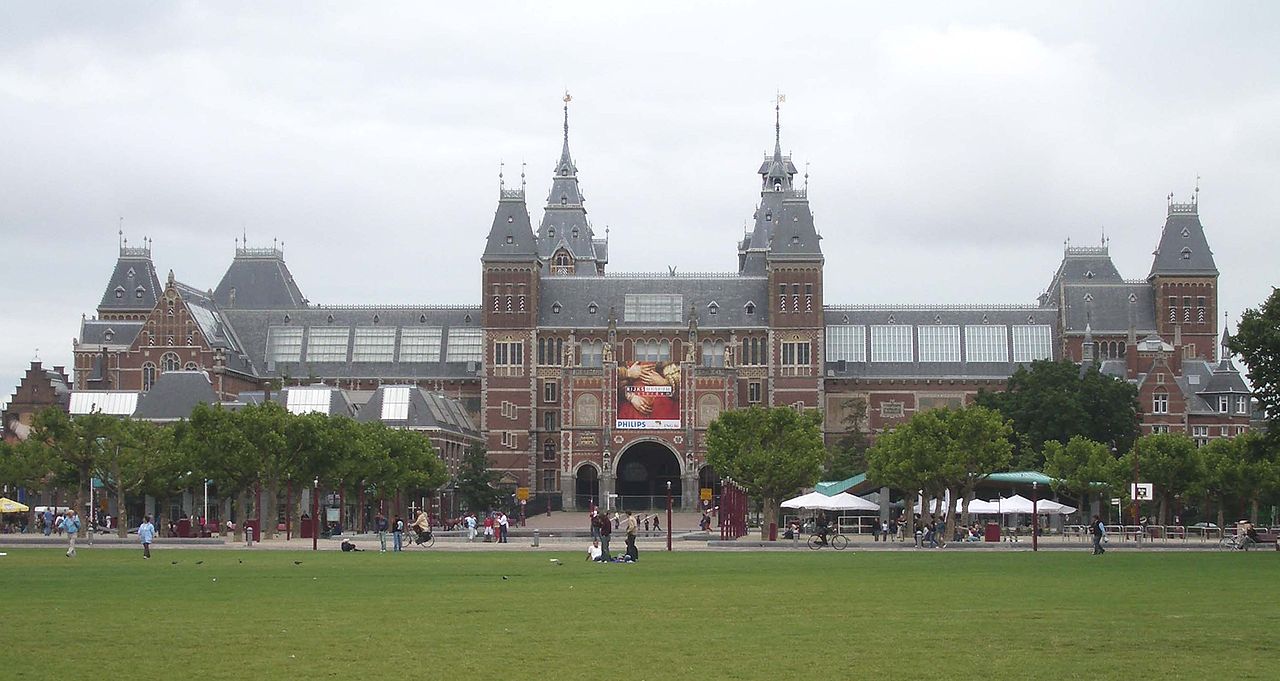 The Rijksmuseum, seen from the Museumplein side, on a bright spring morning.